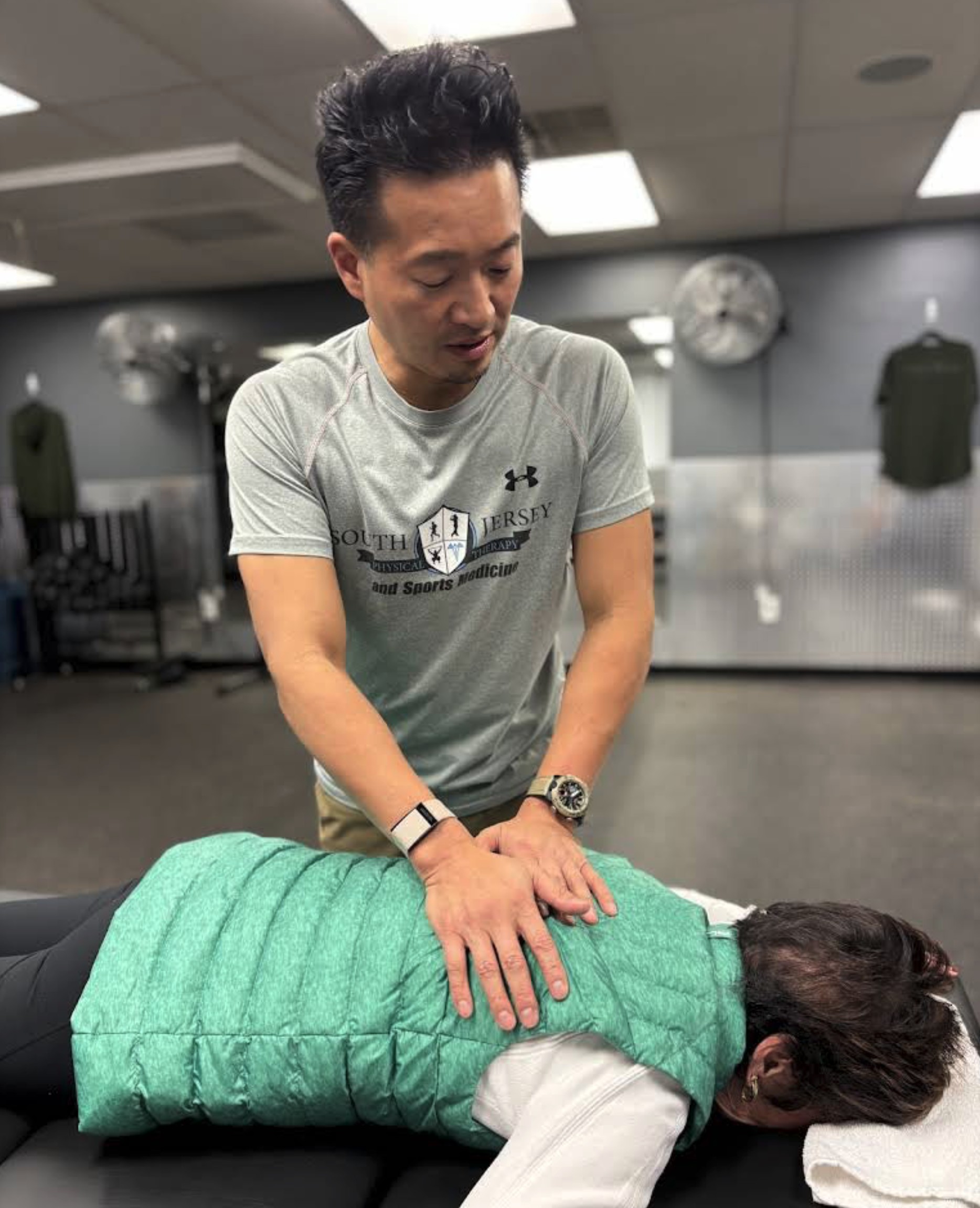Dr. Ken Cheng performing hands-on manual therapy at South Jersey Physical Therapy