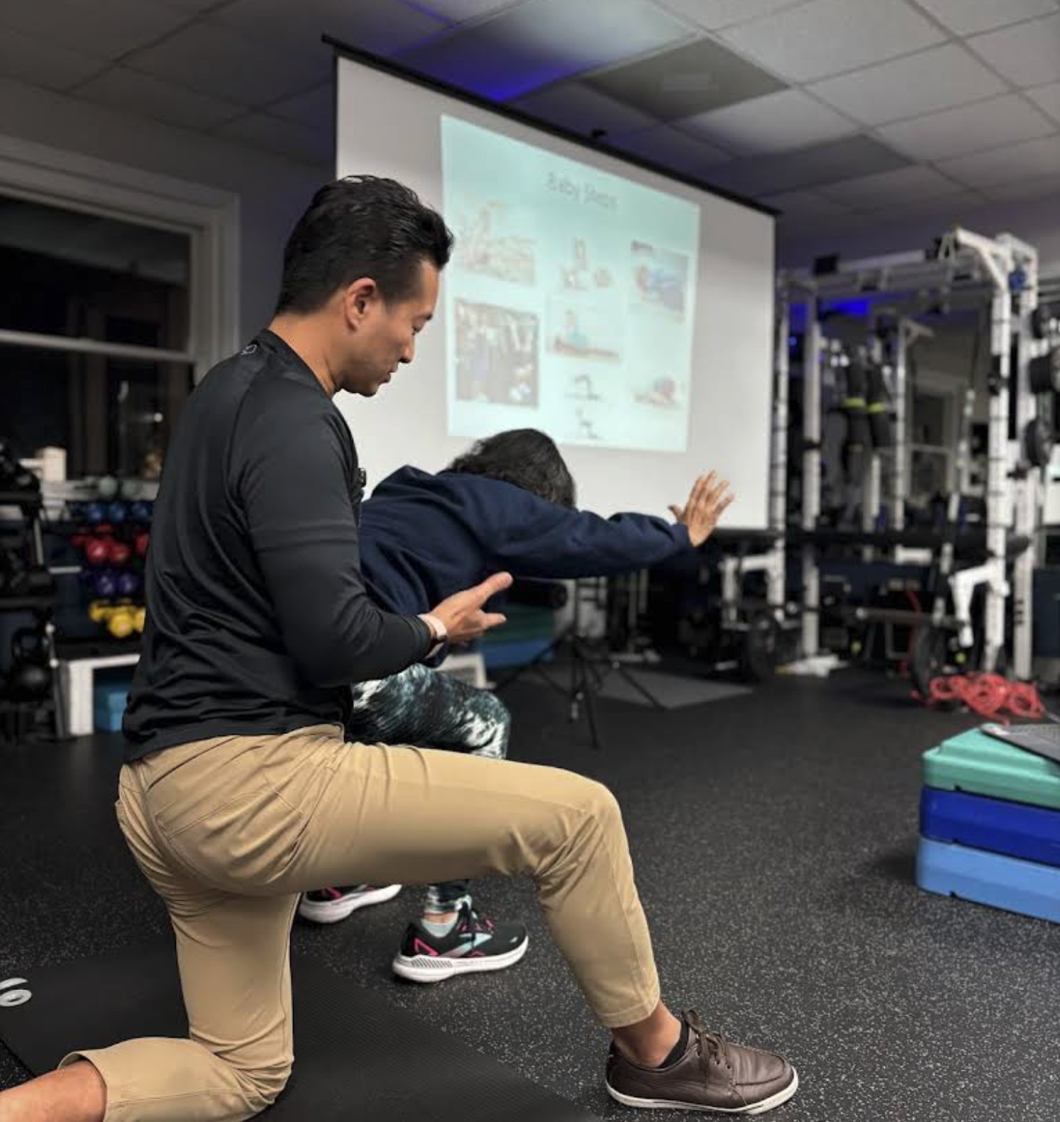 Dr. Ken Cheng performing a movement assessment