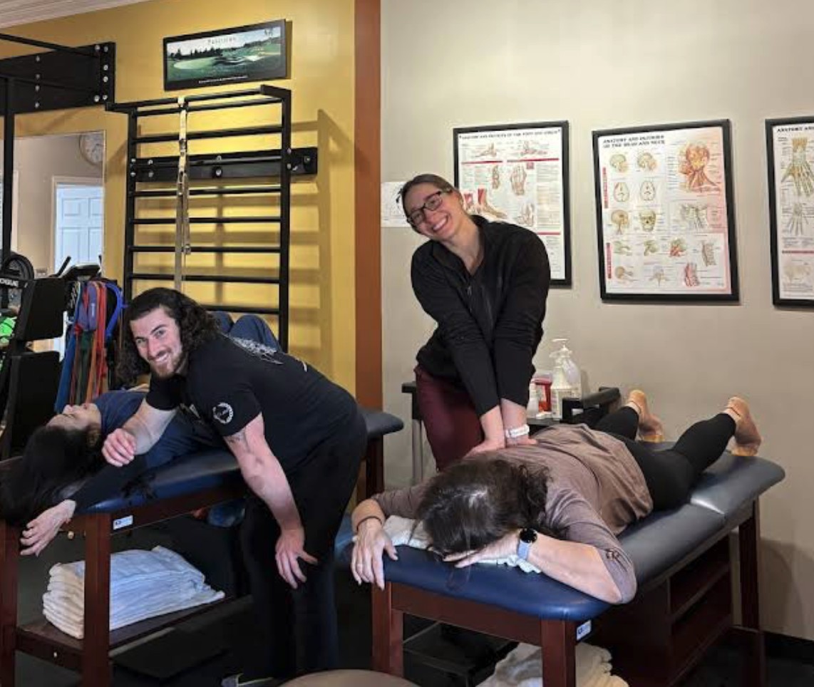 South Jersey Physical Therapy team working with patients in the clinic